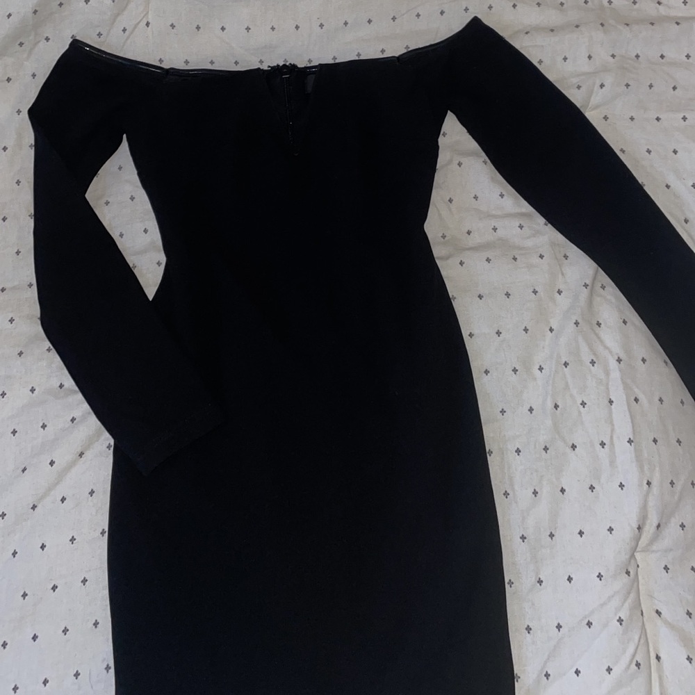 $20 Lulus form fitting off the shoulder little black dress. V-cut neckline.